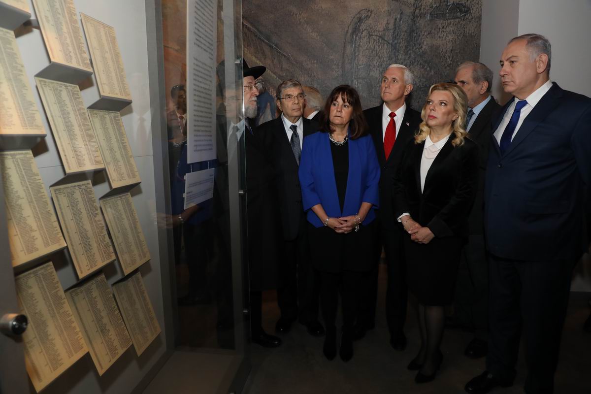 Israel's Prime Minister Benjamin Netanyahu and his wife Sara (right), Chairman of the Yad Vashem Council Rabbi Israel Meir Lau and Yad Vashem Chairman Avner Shalev (left), the Vice President and Second Lady view the original "Schindler's List" 